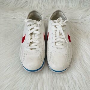 White Sneakers with Red Swoosh